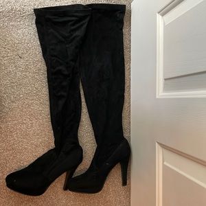Over the knee black boots